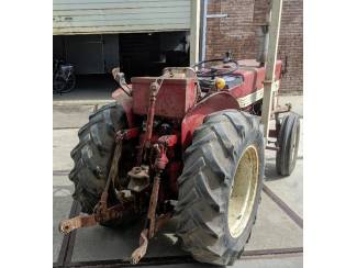 smalspoortractoren Mccormick International 423 en Douven boomgaardspuit